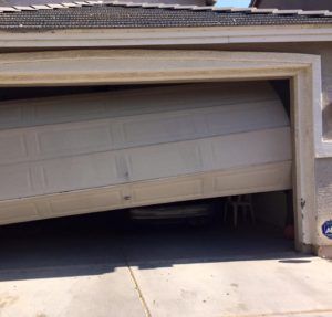 damaged-garage-door-panel-phoenix